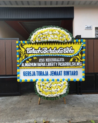 Papan Bunga Duka di Kaubun